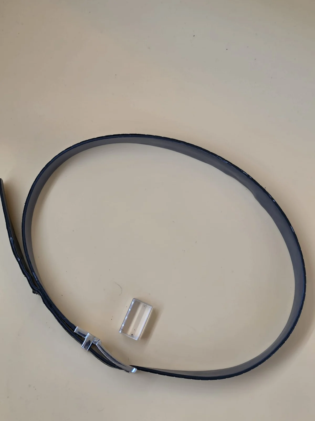An overhead view of the belt, showing the strap and buckle together.