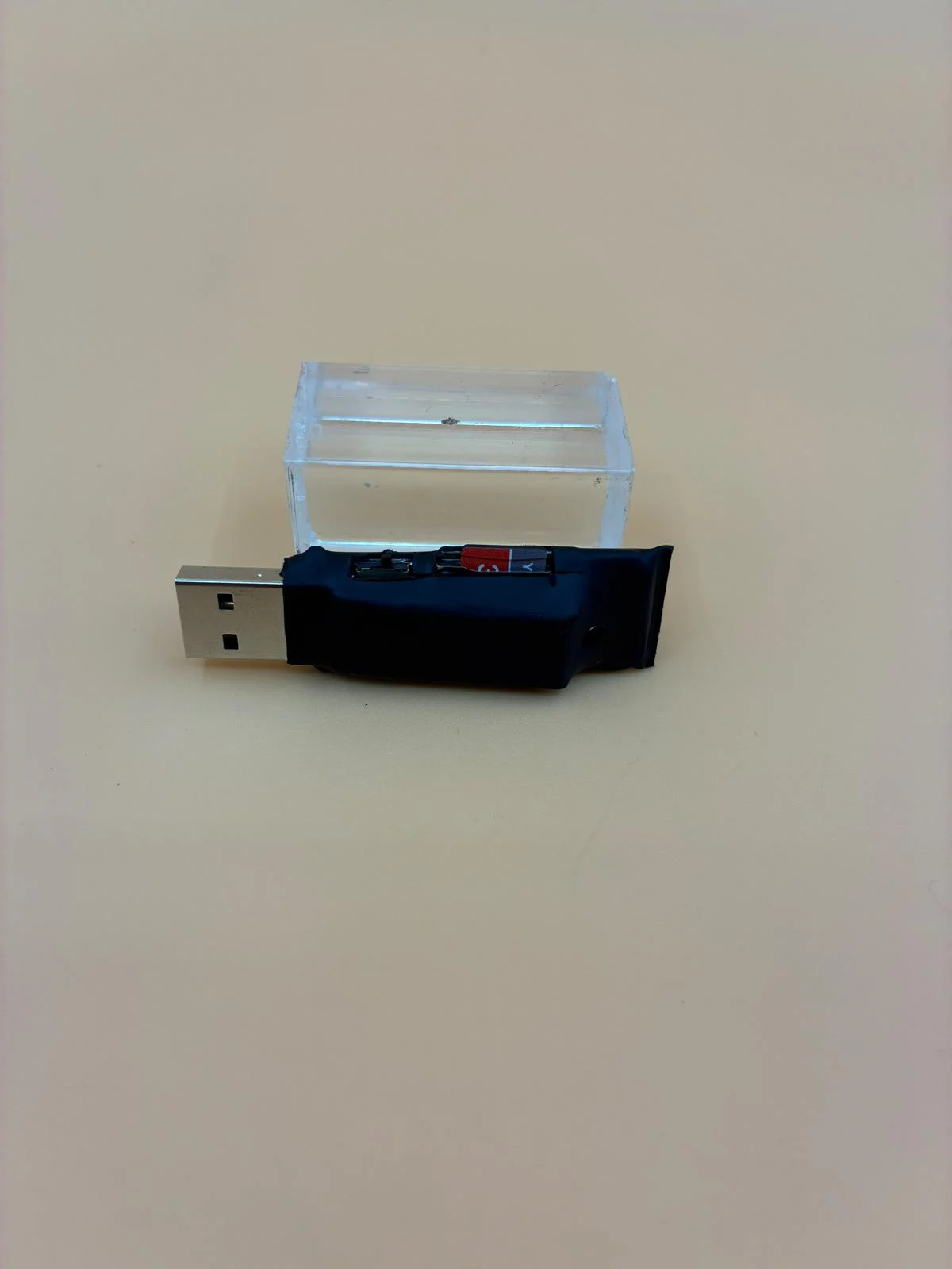 Side view of a compact USB voice recorder available from SPY WORLD.