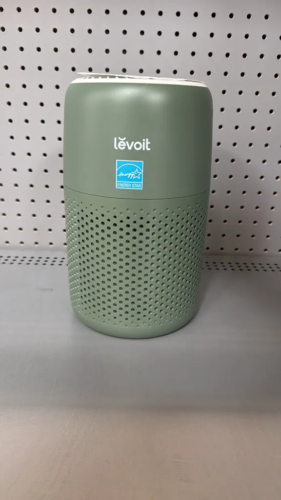 Green functional air purifier with integrated hidden camera configuration
