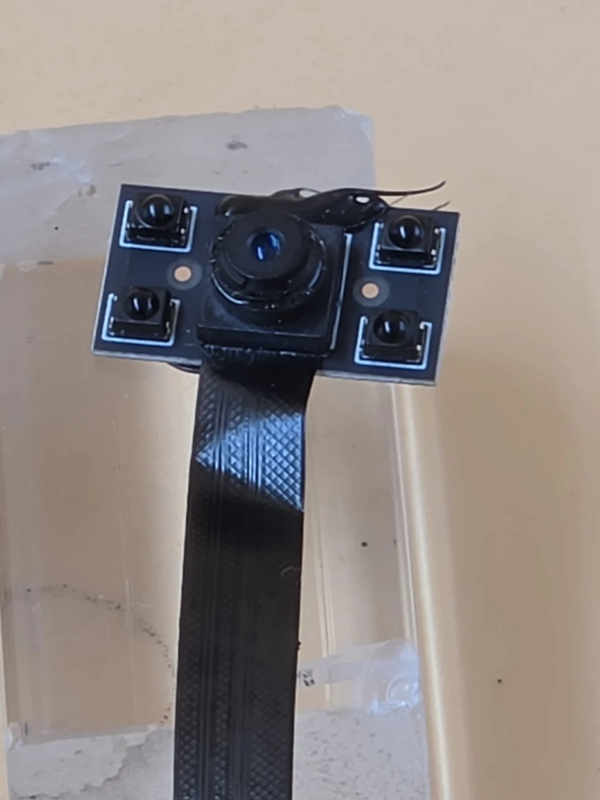 Close-up of the camera module, showing its central lens and surrounding components.