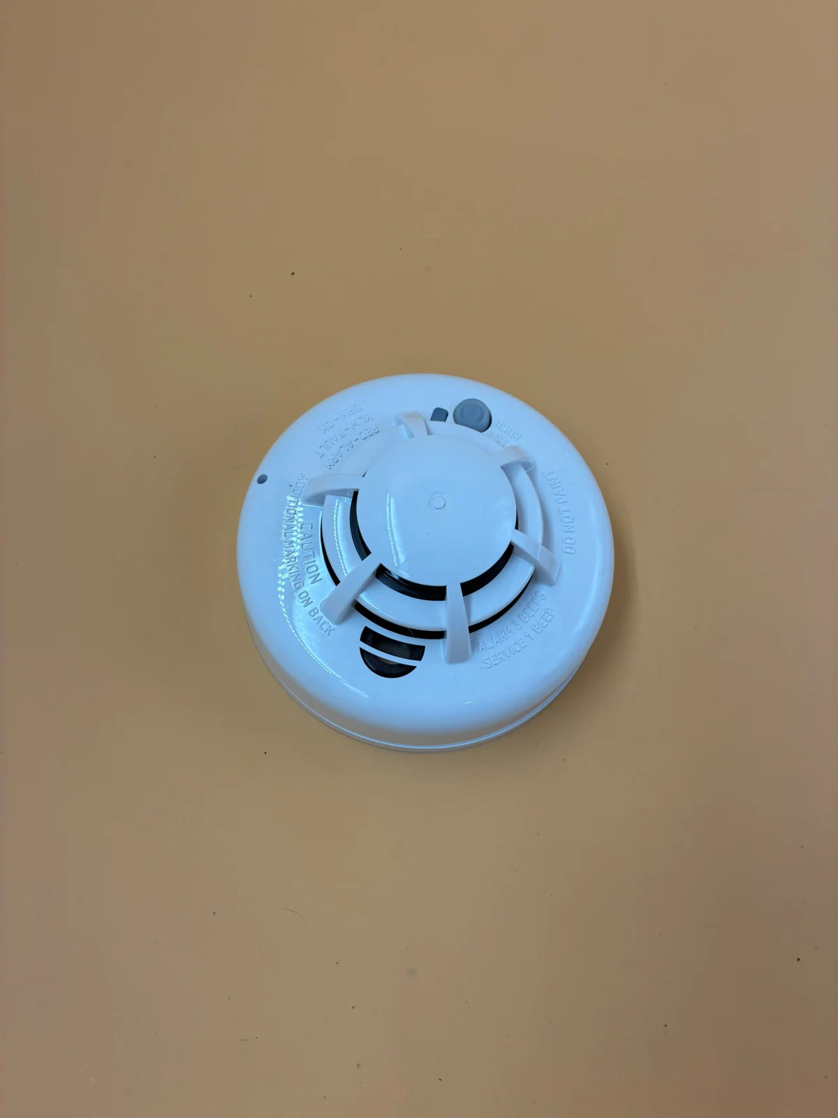 A smoke-detector-style design that customers can ask about at SPY WORLD.