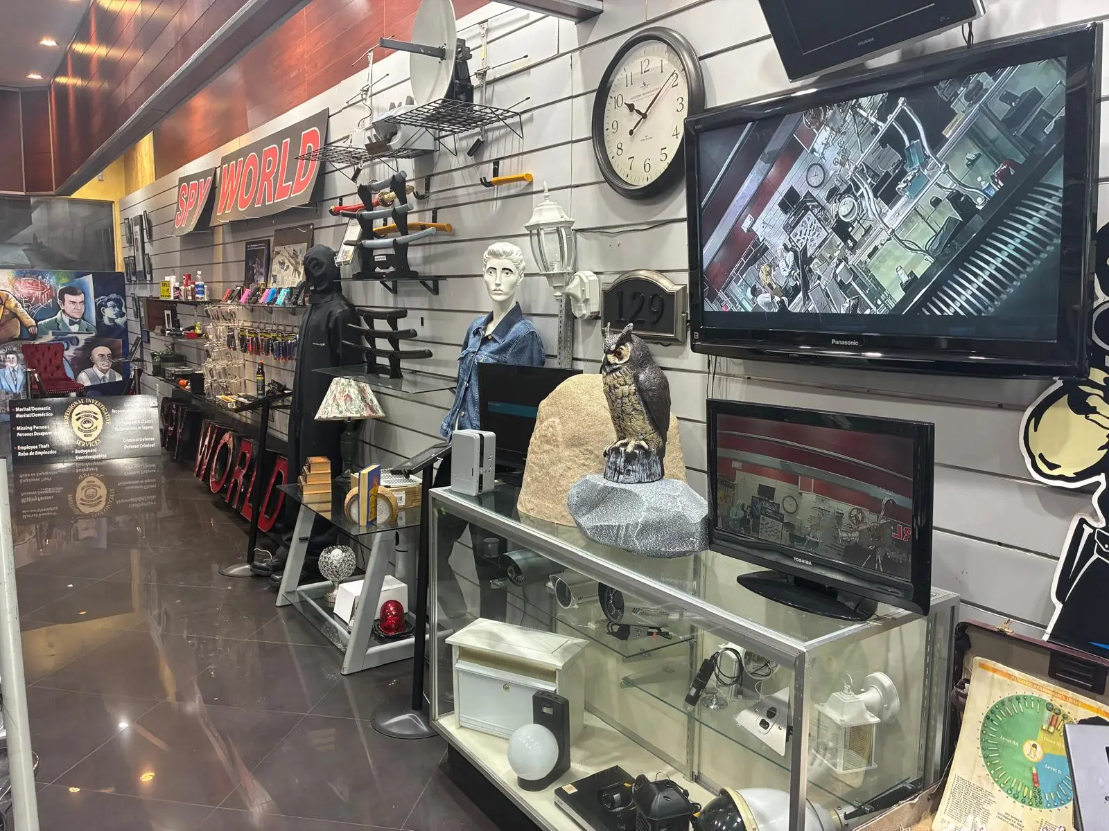 SPY WORLD showroom with cameras, detection equipment, and security products