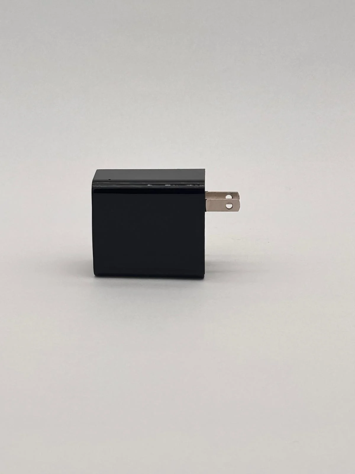 USB charger-style camera: side view