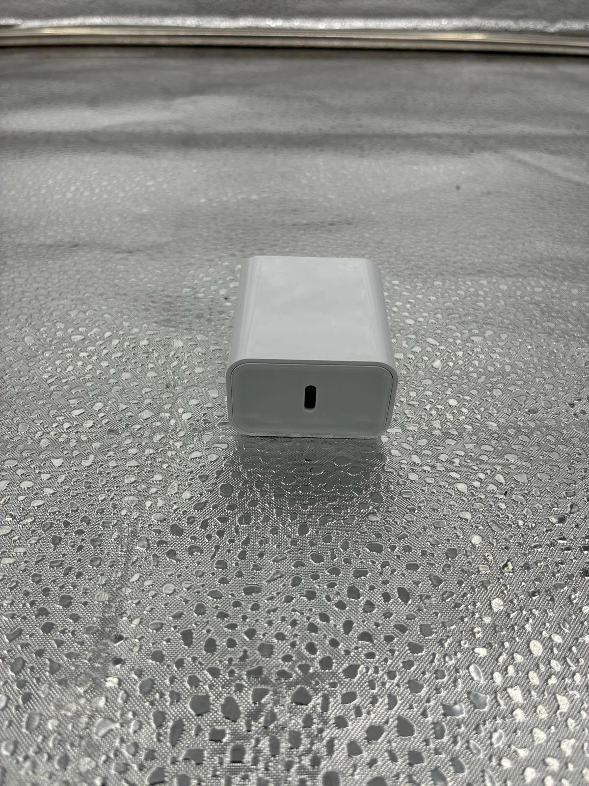 USB charger-style camera in a light housing