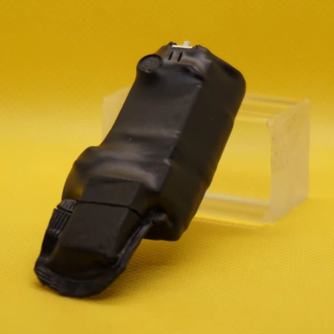Compact audio recording device displayed on a yellow background