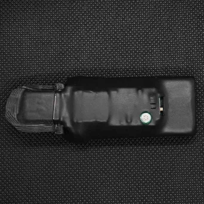 Close-up of a portable voice recorder on a dark background